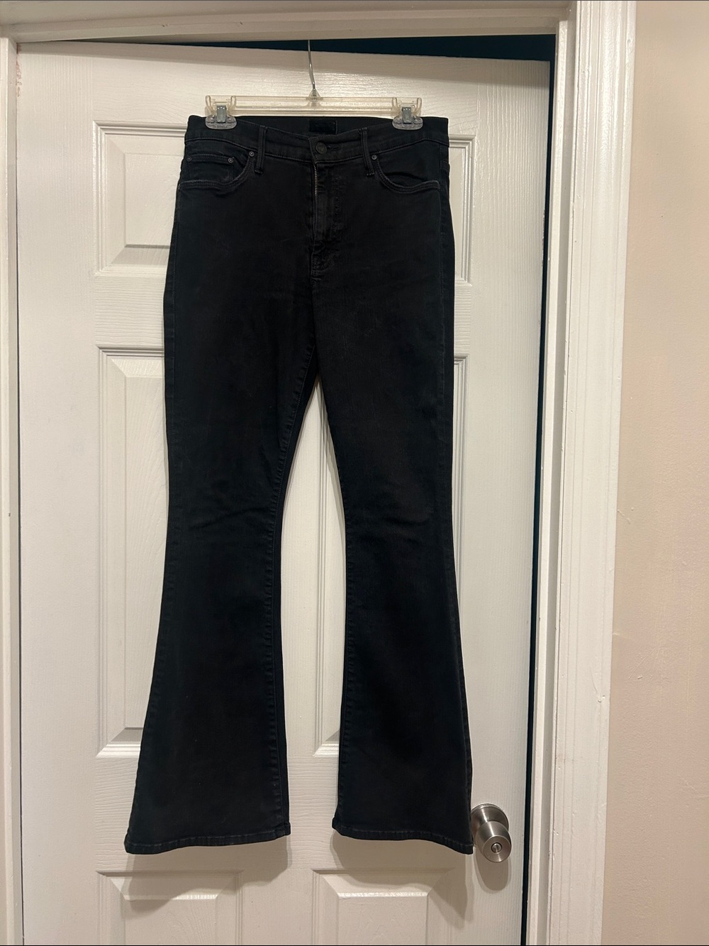 Women's Black Flared MOTHER Jeans - The Weekender in color Not Guilty